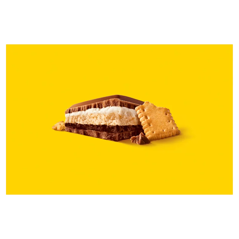 Milka Mmmax alpesi tejcsokoládé kakaós-tejes krémtöltelékkel és keksszel töltve 300 g